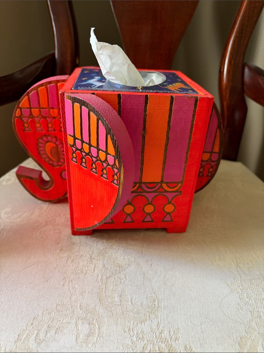 Whimsical, psychedelic and very 1970s wooden Family Circle tissue box holder